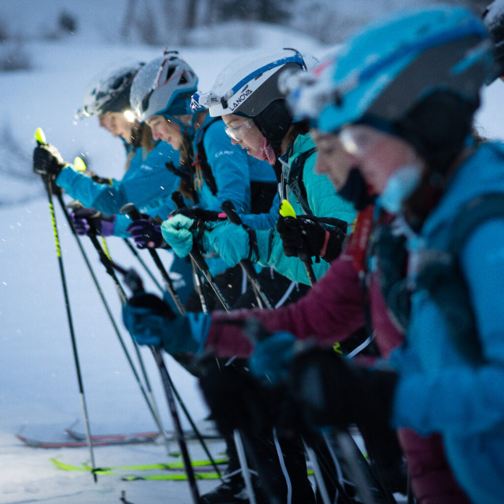 photo of racers getting ready to start skiing